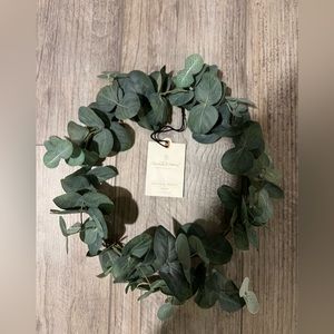 Hearth & Hand with Magnolia Wreath. approximately 12 inches across.